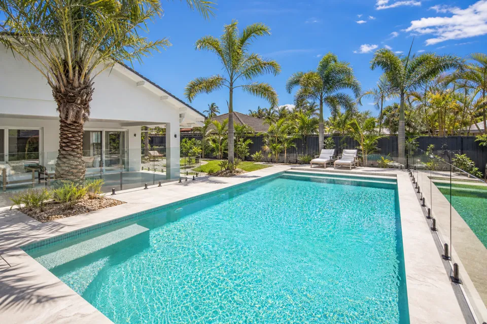 Crystal clear swimming pool in a Gold Coast backyard